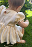 Baby meisje Mia romper jurkje van katoen en mousseline, pofmouwtjes volumineus rokje en strikjes in creme kleur voor baby en dreumes (3 - 24 maanden)